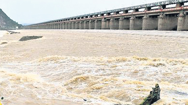 Vijayawada floods 2024 2nd flood warning at Prakasam Barrage as inflow cross 11 lakh cusecs