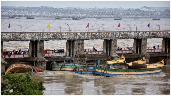 Officials lodged a complaint with the police about the incident of boats breaking the gates of Prakasam barrage Officials lodged a complaint with the police about the incident of boats breaking the gates of Prakasam barrage