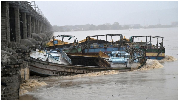 Officials stopped the process of taking out the boats stuck in Prakasam Barrage