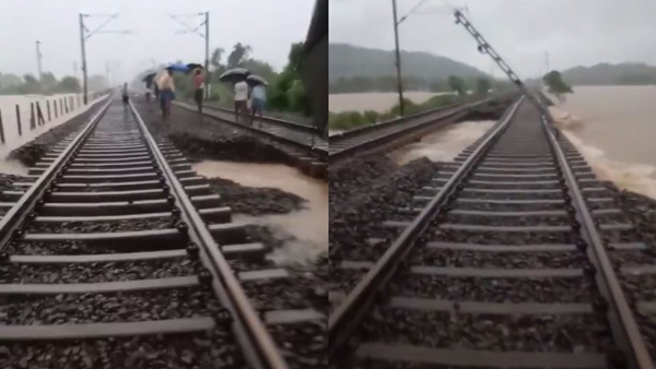 Telangana rains Railway track washed away in Mahabubabad Telangana rains Railway track washed away in Mahabubabad
