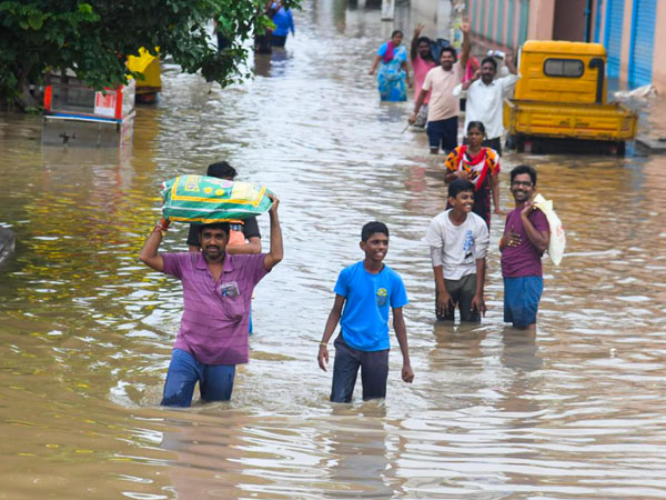 Vijayawada floods 2024 AP Minister decides to utilize their escort vehicles to rescue operations