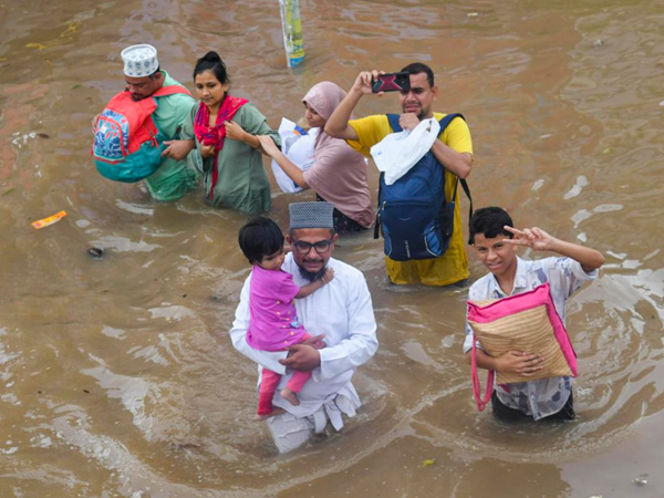 Communist leaders protest against tax Collections in Vijayawada flood Affected areas