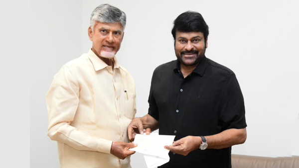 Chiranjeevi meets Chandrababu He presented a check of Rs crore for the flood victims