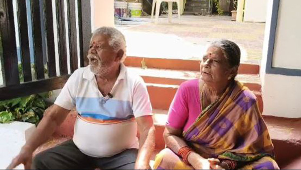 Elderly parents concern in front of daughter house for gold