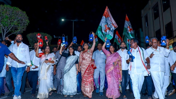 Increase in electricity charges Sharmila s lantern protest against Chandrababu Govt