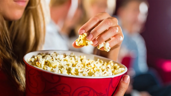 Eating popcorn But be careful with packed popcorn