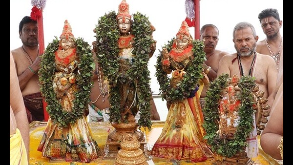Snapana Thirumanjanam and Chakrasnanam to the Lord at the Maha Kumbh Mela Snapana Thirumanjanam and Chakrasnanam to the Lord at the Maha Kumbh Mela