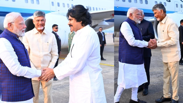 PM Modi holds roadshow in Visakh along with CBN and Pawan draws huge crowds