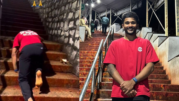 Cricketer Nitish Kumar Reddy climbing stairs of Tirumala to offer prayers to Lord Venkateswara Cricketer Nitish Kumar Reddy climbing stairs of Tirumala to offer prayers to Lord Venkateswara
