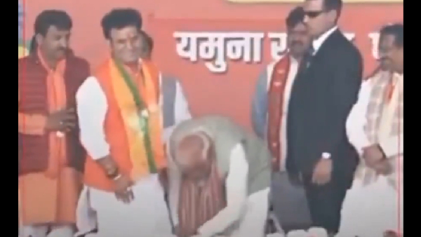 Prime Minister Narendra Modi feet worship Who is that person