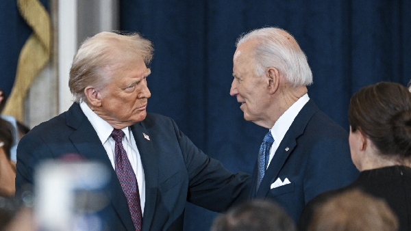 Donald Trump discovers a letter for him from Joe Biden at Oval