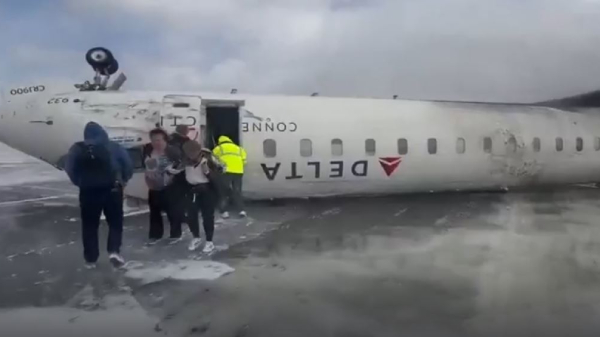 Delta Airlines plane flipped upside down at Toronto airport leaves 18 injured in Canada Delta Airlines plane flipped upside down at Toronto airport leaves 18 injured in Canada