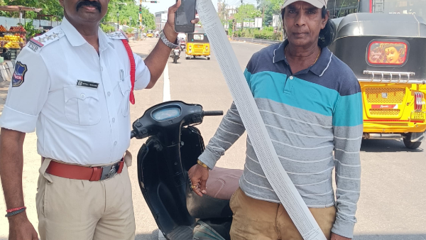 Motorist shocked the police 233 pending traffic challans on a scooty in hanamkonda Motorist shocked the police 233 pending traffic challans on a scooty in hanamkonda