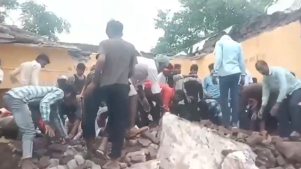 Several children were feared dead after the roof of a school in collapsed Rajasthan Several children were feared dead after the roof of a school in collapsed Rajasthan
