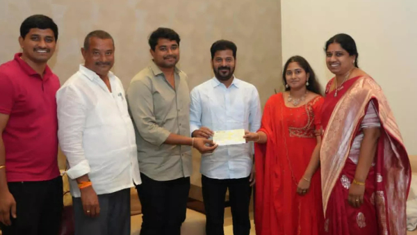 Well done MLA Laxma Reddy gave 2 crore rupees check to cm revanth reddy for farmers urea Well done MLA Laxma Reddy gave 2 crore rupees check to cm revanth reddy for farmers urea