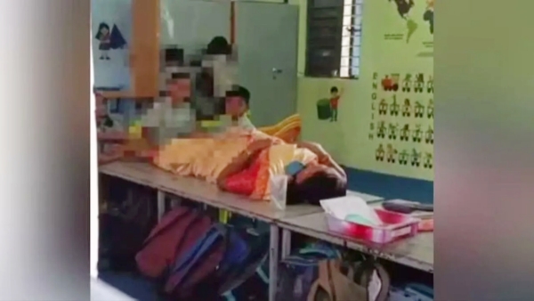 Outrage in Tamil Nadu Headmaster Forces Students to Massage Legs in Viral Video Outrage in Tamil Nadu Headmaster Forces Students to Massage Legs in Viral Video