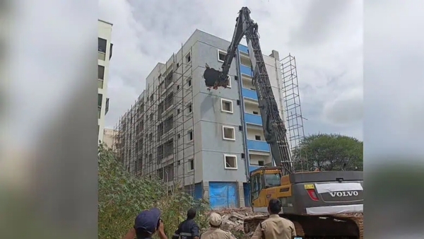 HYDRAA s Mega Bulldozer Raid 5-Storey Illegal Tower Crumbles in Miyapur HYDRAA s Mega Bulldozer Raid 5-Storey Illegal Tower Crumbles in Miyapur