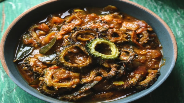 bitter-gourd-curry-making-recipe-in-telugu-with-easy-steps-as-andhra-style-and-serving-tips