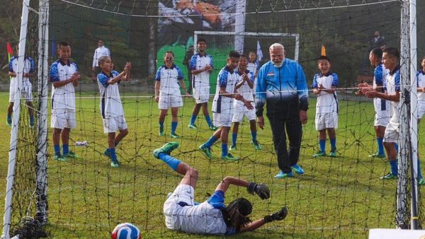 pm-modi-modi-played-football-with-youngsters-in-gangtok-a-day-after-wrapping-up-his-west-bengal-ele