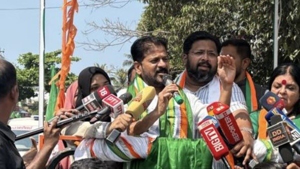 revanth-reddy-s-explosive-claims-modi-vijayan-secret-deal-sparks-debate