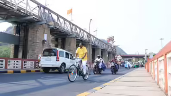 AP Minister Nimmala Rama Naidu cycled 10 km to CMO in the scorching sun as part of No Vehicle Day