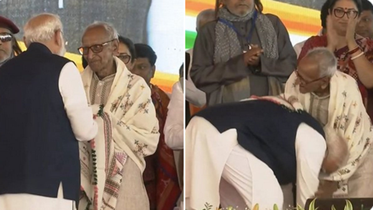 మోదీ పాదాభివందనం చేస్తున్న పెద్దాయన ఎవరో తెలుసా..!?