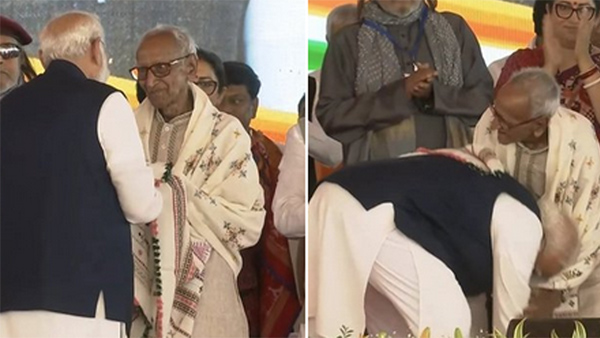 PM Modi took blessings and felicitated Makhanlal Sarkar one of the most senior BJP workers in West Bengal PM Modi took blessings and felicitated Makhanlal Sarkar one of the most senior BJP workers in West Bengal