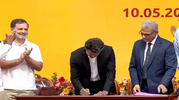 cm-vijay-signs-first-order-gives-200-units-of-free-electricity-to-domestic-users-and-on-other-two cm-vijay-signs-first-order-gives-200-units-of-free-electricity-to-domestic-users-and-on-other-two