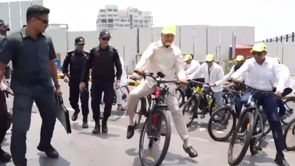 Chandrababu Naidu Nearly Falls Off Cycle in Vizag Quick-Acting Security Prevents Mishap