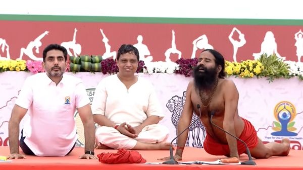 PM Modi Leads International Yoga Day 2026 in Kolkata CM Naidu Practises With Ramdev Baba in Vijayawada