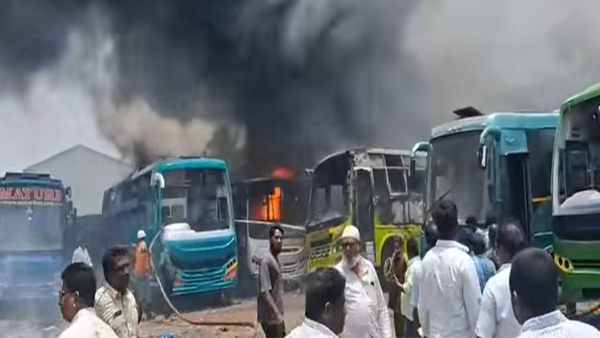 fire-accident-in-the-autonagar-area-of-vijayawada-that-leads-to-7-buses-completely-burnt-down fire-accident-in-the-autonagar-area-of-vijayawada-that-leads-to-7-buses-completely-burnt-down
