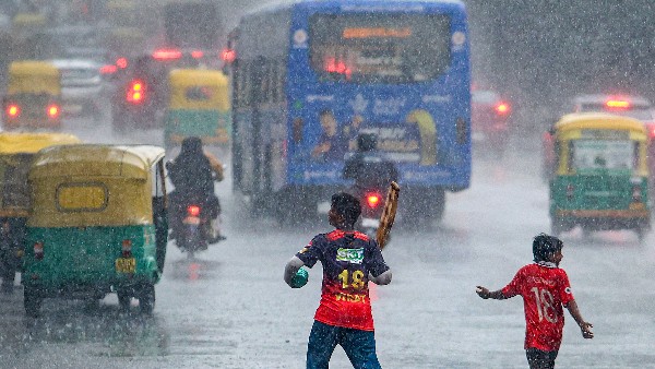 Heavy Downpour in Bengaluru triggered waterlogging and traffic delays across parts of the city travel