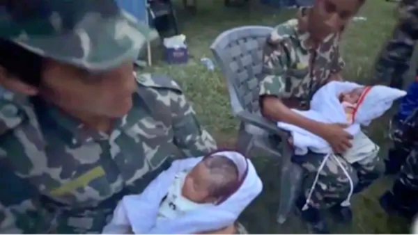 NepalArmy rescues twins from Nepal floods Viral video Nepal Army rescues twins from Nepal floods