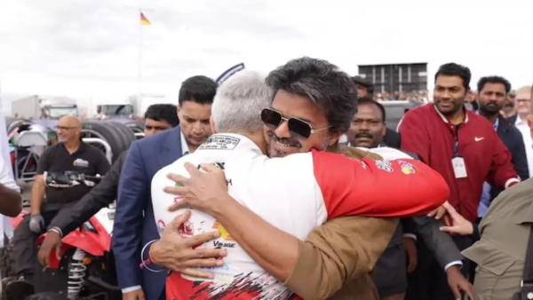 ajith-kumar-hugs-tamil-nadu-cm-vijay-at-silverstone-racing-circuit-goes-viral-in-social-media-here