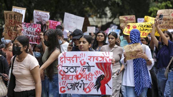 Delhi University Women Students Protest in Rain Demanding Safety and Action After Astha Kunj Incident