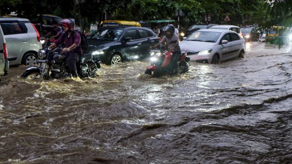 Heavy Rains Lash Delhi NCR Waterlogging Disrupts Commute and Flights at IGI Airport as IMD Issues Warning