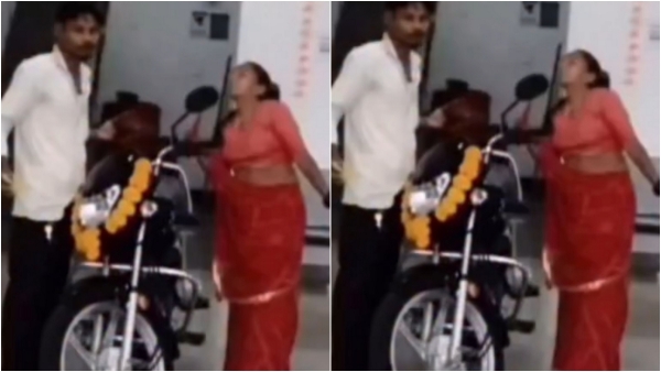 Durga I am Goddess Durga Will you lower the price of the bike or not A woman at a bike showroom