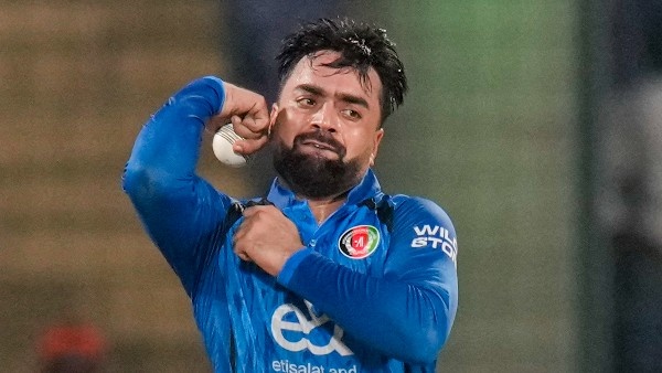 Rashid Khan Scripts History as become the 1st bowler in T20i to claim 200 wickets in Zimbabwe match Rashid Khan Scripts History as become the 1st bowler in T20i to claim 200 wickets in Zimbabwe match