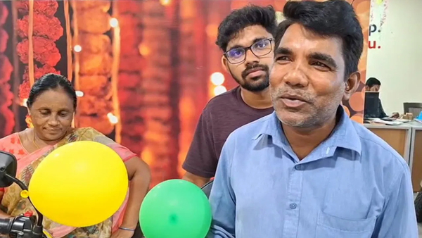 wife gifted moped to husband Wife Saves Rs 50 000 in Coins to Gift Husband a TVS Moped in Khammam