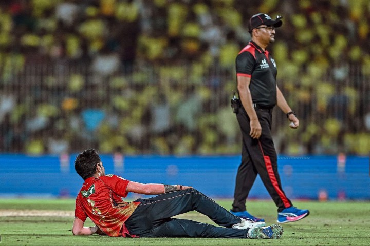 YUZI CHAHAL WITH HIS SIGNATURE POSE.