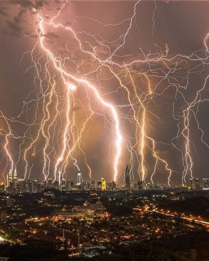 This phenomenal image is a stack of 32 shots taken over 40 minutes during a lightning storm in Kuala Lampur, Malaysia.