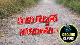 People facing severe hardships due to a gravel road