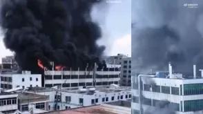 28 Killed in China After Shoe Factory Catches Fire; Workers Wave for Help From Rooftop | Watch