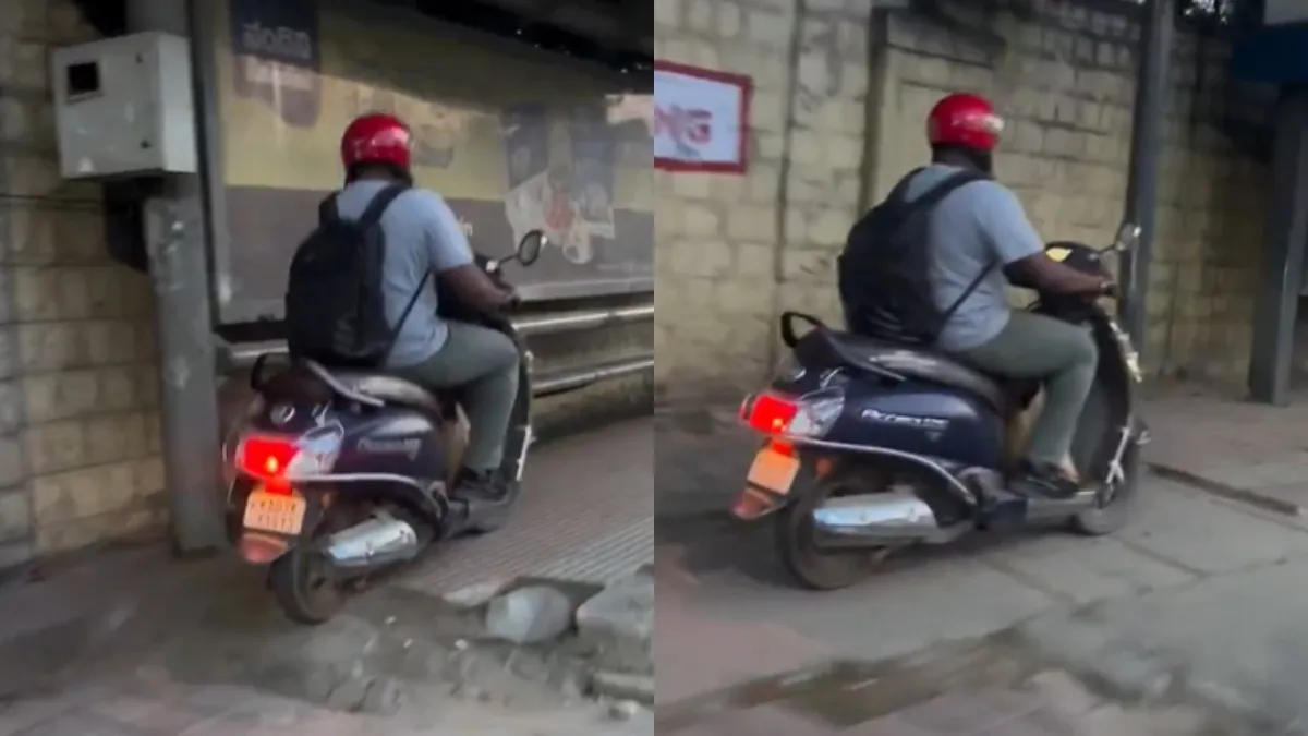 ರಸ್ತೆ ಖಾಲಿಯಿದ್ರೂ ಫುಟ್‌ಪಾತ್ ಮೇಲೆಯೇ ಸ್ಕೂಟರ್ ರೈಡಿಂಗ್: ಬೆಂಗಳೂರಿನಲ್ಲಿ ಸವಾರನ ಹುಚ್ಚಾಟದ ವಿಡಿಯೋ ವೈರಲ್